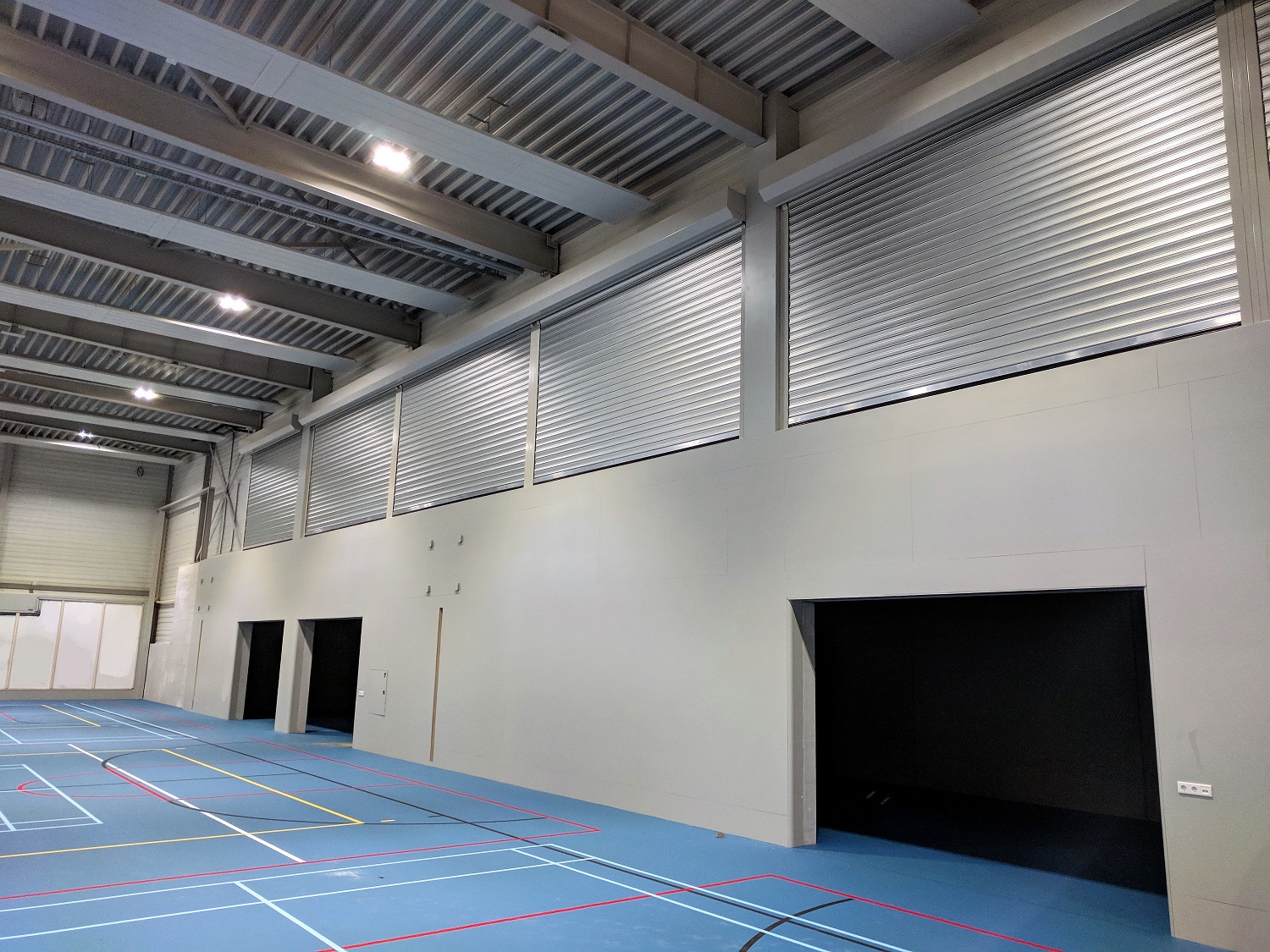 Sporthal Udens College met geluidwerende rolluiken